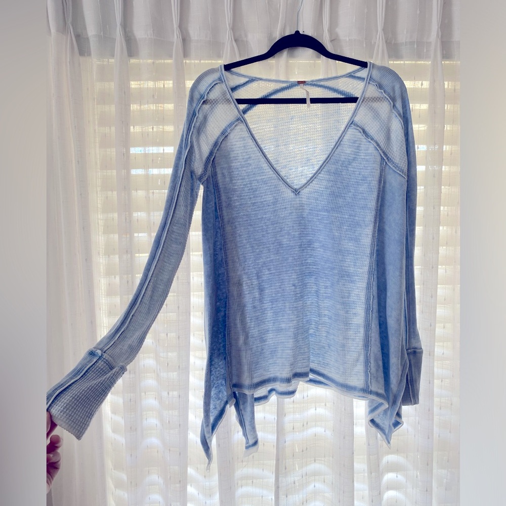 Light blue Free People long sleeve tee.